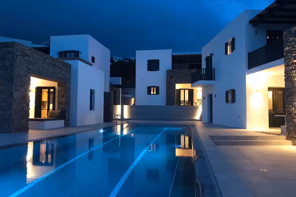 ALENA | PAROS — view across the suites at golden hour, Paros